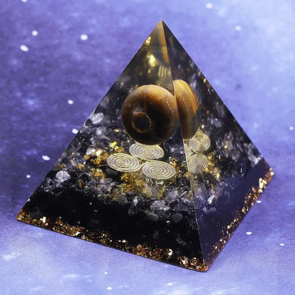 Beautiful orgonite pyramid for chakra healing and home decoration