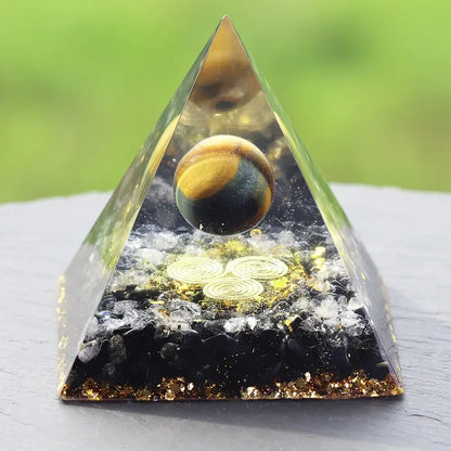 Beautiful orgonite pyramid for chakra healing and home decoration